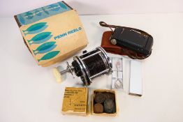 A boxed Penn Senator 6/0 Big Game Reel, a collection of Victorian and later One Penny coins,