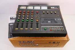 A boxed TEAC Tascam Series Model 144 Portastudio 4-track recorder, with instructions, untested.