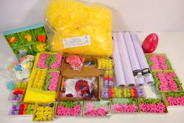 A large charity lot to include seasonal crafting materials, a bevel edge wall mirror, notice board,