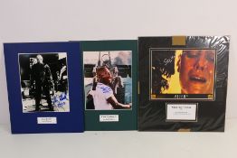 Three signed photographic display pieces comprising Sigourney Weaver, Alien 3, Kane Hodder,
