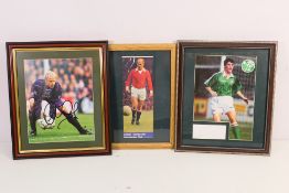 Manchester United Football Club - Three signed and frame photographic images comprising Sir Bobby