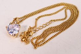 An unmarked yellow metal stone set pendant and necklace, 44 cm (l), approximately 4.
