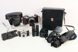 Cameras and binocular to include Canon, Praktica, Ferrania, Tasco and other.