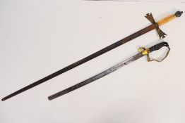 Two swords including a sabre with brass guard and wire bound grip and another with bone grip,