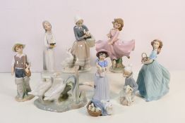 A collection of unboxed Lladro figures / groups to include # 6130, Spring Enchantment, # 4809,