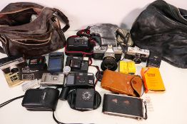 Photography - A collection of cameras and accessories to include a Canon FTb, Canon Snappy EL,
