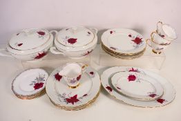 A collection of Royal Stafford dinner and tea wares decorated in the Roses To Remember pattern,