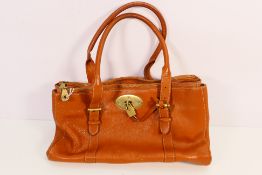 A brown leather Mulberry handbag with gold-tone hardware, with padlock and key.