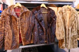 Three fur coats / jackets, two with makers labels for S Gould and Tissavel, no size labels,