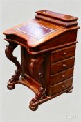 A mahogany Davenport desk of typical form, gilt tooled leather skiver to the slope front,