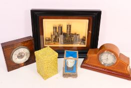 A vintage Smiths car dashboard clock, Arabic numerals to the signed silvered dial, numbered H-33580,
