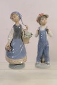 Two Lladro figures comprising # 4898, Boy From Madrid and # 5024, Girl With Scarf,