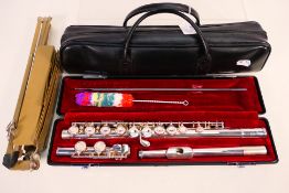 A Yamaha silver flute, Model YFL411, with solid silver headjoint,