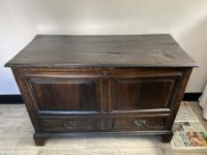 An 18th century oak mule chest with two base drawers and hinged cover,