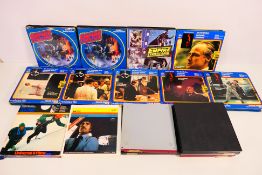 A collection of Super 8 cine film reels,