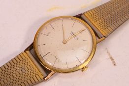 A gentleman's Juvenia Slimatic automatic, stainless steel cased wristwatch, 21 jewel cal.