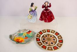 A Royal Crown Derby Old Imari pattern plate, # 1128, 22 cm (d) with printed factory marks,