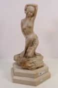 After Giuseppe Bessi (Italian 1857-1922) - A faux marble sculpture depicting a semi-nude female