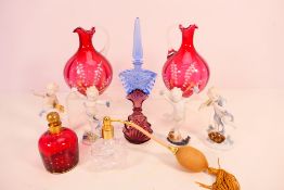 A collection of glass scent bottles and jugs and four Ilmenau porcelain figures depicting the four