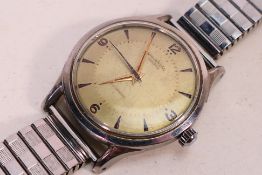 A vintage Universal Geneve automatic wristwatch, Arabic numerals to the quarters,