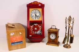 Two clocks including a wall clock, a fireside companion set and a boxed Paterson 300 Projector.