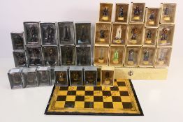 A Lord Of The Rings themed chess set, each piece contained in individual box,