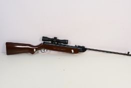 SMK - A Sportmarketing XTB2K Cal .22 air rifle with attached SMK 4 X 32 scope.