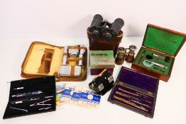 A mixed lot to include technical drawing sets, travel grooming kit, binoculars,