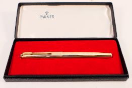 A 12ct rolled gold Parker fountain pen with 14K nib, contained in Parker presentation box.