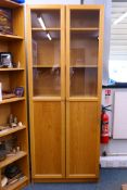 An Ikea twin door Billy bookcase, approximately 201 cm x 80 cm x 32 cm.