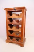 A Wooden Wine Rack holds up to 10 bottles,