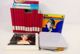 A collection of boxed Super 8 cine film reels, some in pictorial boxes, labels include Dracula,
