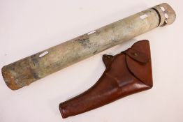 An incendiary bomb (training device), 56 cm (l) and a leather pistol holster.