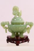 A Chinese jade / hardstone tripod censer and cover,