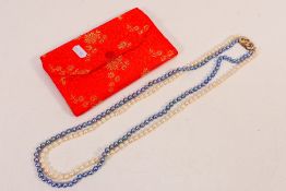 A twin strand cultured pearl necklace, 75 cm (l),