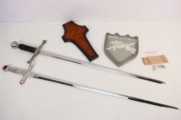 Two decorative wall hanging sword displays, each with display plaque.