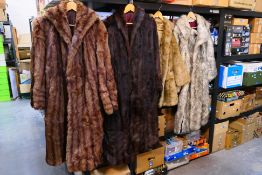 A collection of fur coats including one with makers label for Glenoit,