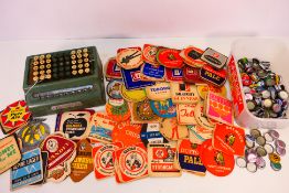 A Plus adding machine by Bell Punch Company Ltd and a collection of vintage beer mats and bottle