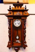 An early 20th century Vienna style wall clock,