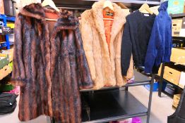 A fur coat, no size or makers label, a Femina Furs fur jacket, size 12 and two cashmere jumpers,