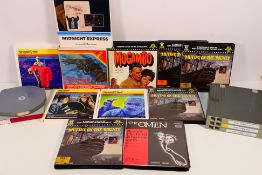 A quantity of boxed Super 8 cine film reels, predominantly pictorial boxes,