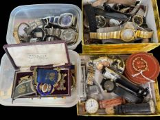 Collection of watches and medals.