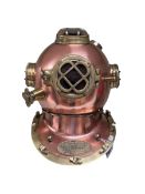 Reproduction US Navy brass and copper diving helmet.