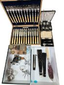 Three silver napkin rings, cased set of fish eaters, postal scales, fans, cased teaspoons.
