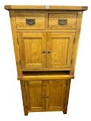 Two oak side cabinets,