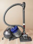 A Dyson vacuum cleaner.