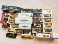 Boxed and unboxed die cast models including Atlas Editions Eddie Stobart haulage wagons,