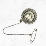 A late 19th century memorial brooch set with rose-cut diamonds, diameter 16 mm.
