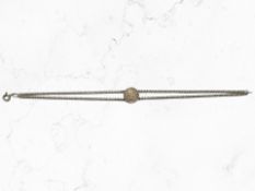 A sterling silver bracelet mounted with a gold-plated coin depicting Pope John Paul II,