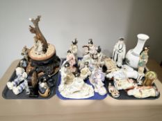 A large quantity of reproduction oriental porcelain earthenware figures, vase, cork diorama, etc.